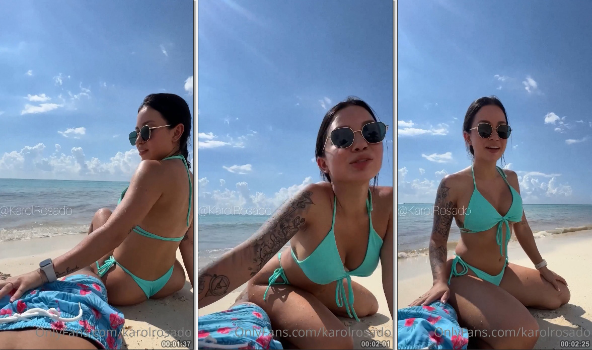 Karol Rosado se deliciando com um visitante sortudo na beira do mar