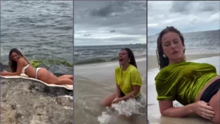 Paolla Oliveira curtindo a praia com uma roupa transparente